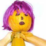 Doll made of pumpkins periwig and leaves
