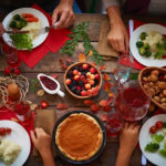High angle view of festive table and people eating