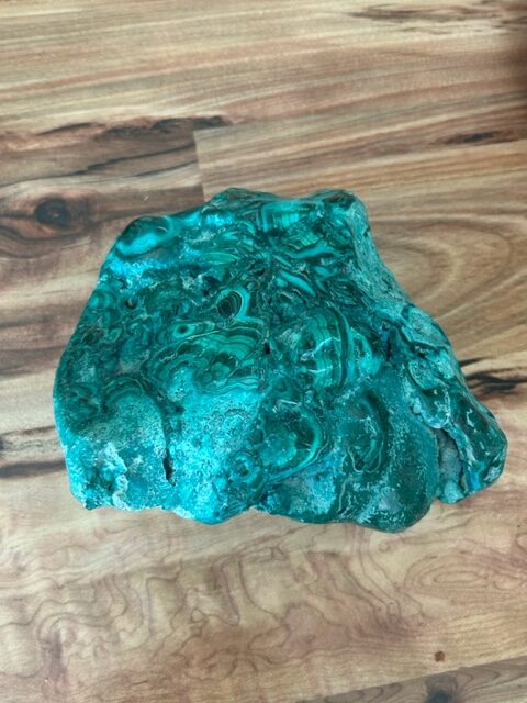 A malachite and chrysocolla crystal that was chosen by the author.